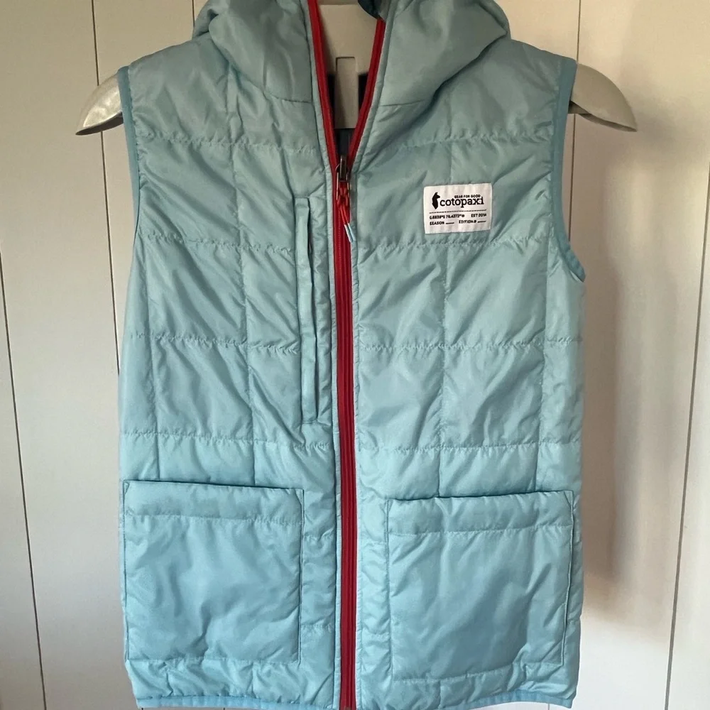 Cotopaxi Multi-blues Reversible Hooded Puffer Vest - Picture 3 of 11